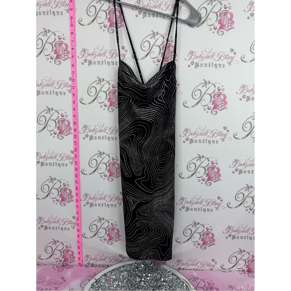 Divided sparkly dress Black Dress with Silver Swirl Accents